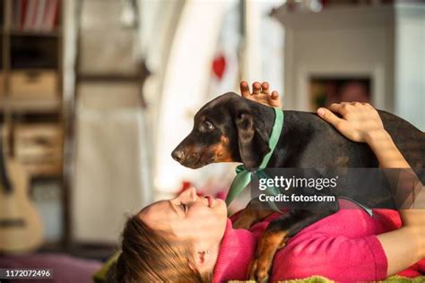 dog knotting a woman